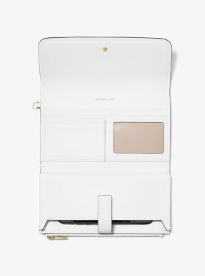 Bolso de pulsera para smartphone Jet Set mediano de piel granulada in BLANCO INTENSO | Michael Kors