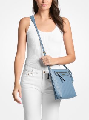 Grand sac &agrave; bandouli&egrave;re Jet Set Travel en cuir &agrave; logo en relief in CHAMBRAY | Michael Kors