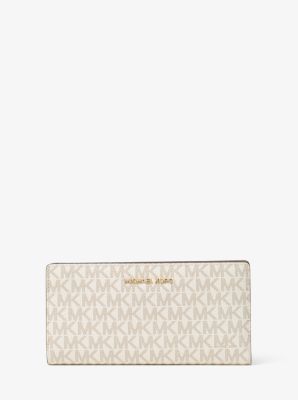 You should definitely buy this sleek Michael Kors wallet while