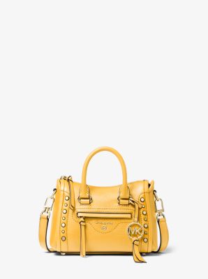 yellow studded michael kors bag