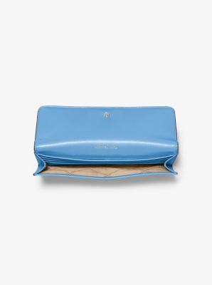 Grand portefeuille Jet Set en cuir Saffiano à bouton-pression à l’avant