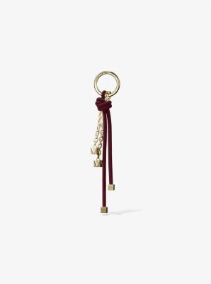 MK Taschenanhänger Im Goldton Mit Bändern - Lila