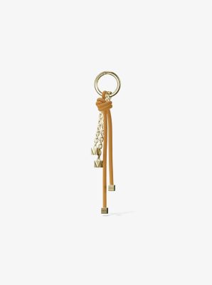 Taschenanhänger im Goldton mit Bändern