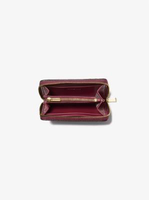 Cartera Jet Set pequeña de piel con motivo de serpiente en relieve image number 1