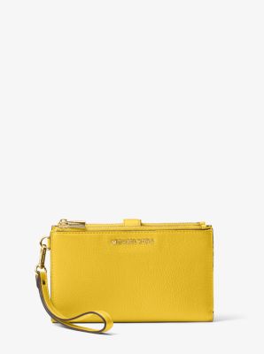 yellow michael kors wristlet