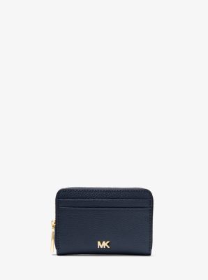 You should definitely buy this sleek Michael Kors wallet while