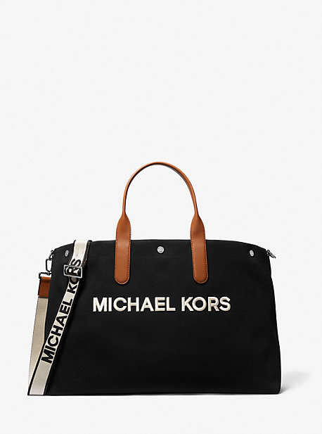 Shop Michael Kors Brooklyn Oversized Cotton Canvas Tote Bag In Black