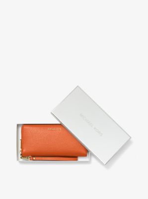 Pebbled Leather Continental Wristlet in LT TERRACTTA | Michael Kors