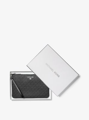 Michael kors silver wristlet hotsell