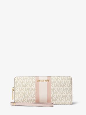 white mk wristlet