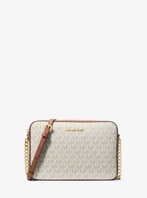 Top 71+ imagen michael kors logo crossbody