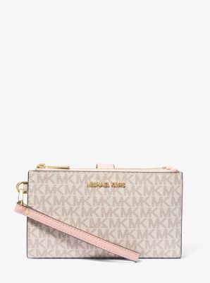 How much is michael kors wallet hotsell