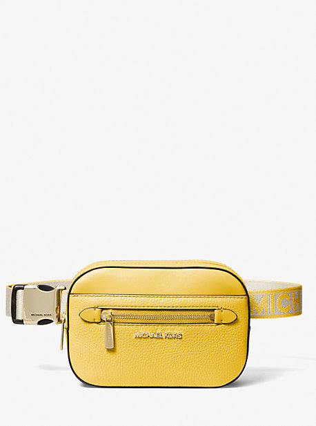 Shop Michael Kors Jet Set Small Pebbled Leather Belt Bag In Yellow