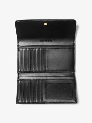 Cartera Jet Set Travel grande con tres pliegues y diseño acolchado image number 1