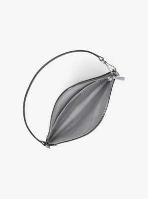 Petite pochette-bracelet Jet Set convertible en cuir grainé