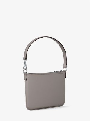 Petite pochette-bracelet Jet Set convertible en cuir grainé
