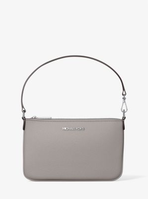 Petite pochette-bracelet Jet Set convertible en cuir grainé