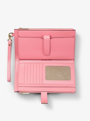 Bolso pulsera Jet Set Travel grande con logotipo exclusivo estampado