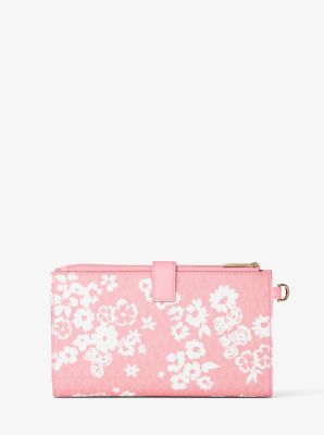 Bolso pulsera Jet Set Travel grande con logotipo exclusivo estampado