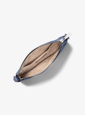 Petite pochette-bracelet Jet Set Travel en denim jacquard &agrave; logo