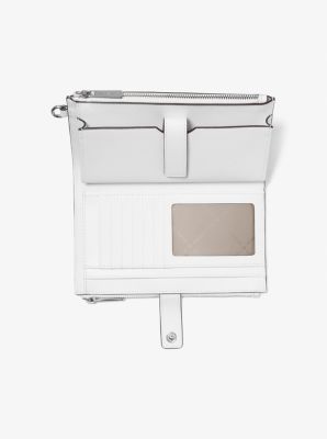 Jet Set Travel Rainbow Logo Embossed Wristlet