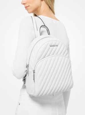 Michael kors abbey medium best sale logo backpack