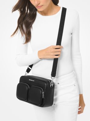 Perforated crossbody outlet bag