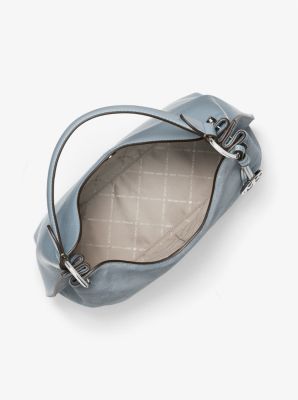 Grand sac &agrave; &eacute;paule Joan en su&egrave;de perfor&eacute; &agrave; logo