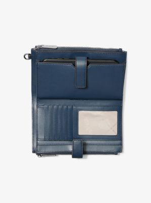 Pochette-bracelet Jet Set Travel en denim &agrave; ornements