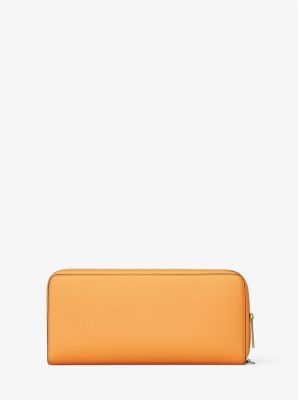 Grande pochette-bracelet Jet Set Travel en cuir grainé
