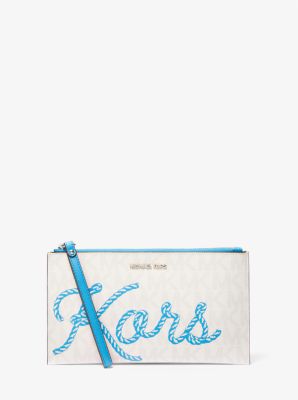 Bolso de mu&ntilde;eca Jet Set Travel KORS grande con logotipo in PISCINA | Michael Kors
