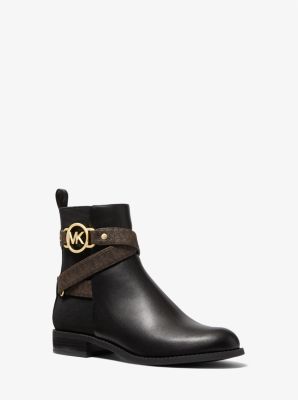 Michael kors black hotsell boots with gold zipper