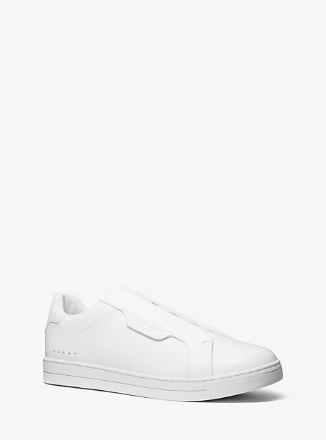 Shop Michael Kors Keating Leather Slip-on Sneaker In White