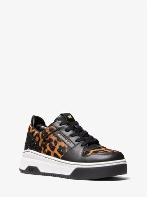 Arriba 46+ imagen michael kors animal print tennis shoes