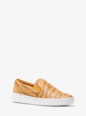 MICHAEL Michael Kors Women's Keaton Coated Canvas Two-Tone Logo Slip-On  Sneaker