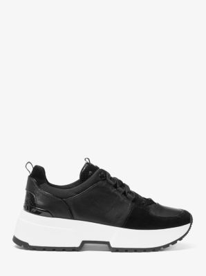 Michael kors cosmo hot sale slip on trainers