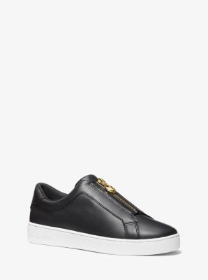 Michael kors black on sale and gold tennis shoes