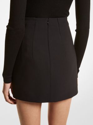 Minigonna in crêpe martellato stretch in NERO | Michael Kors