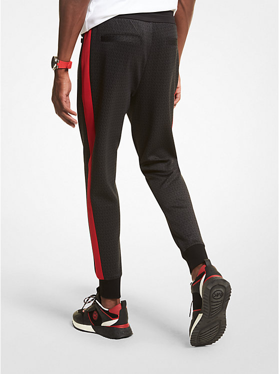 Pantalon de jogging en tricot extensible rayé à logo image number 1