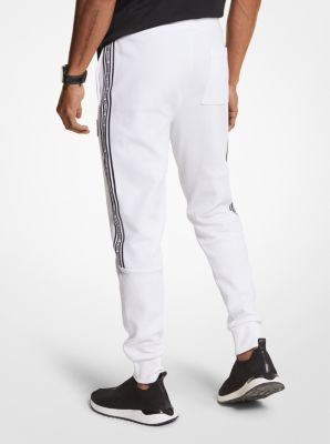 Pantalon de jogging en mélange de coton avec bande à logos