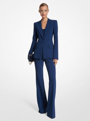 Image of A model for designer Michael Kors wears a navy stretch