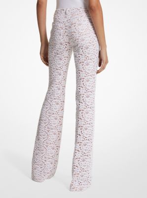 Jeans aus schnurgebundener Blumenspitze mit Schlag