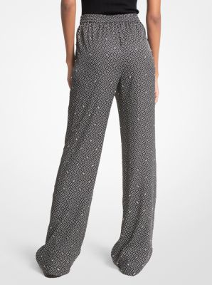 Pantalone pigiama in satin con logo e decori image number 1