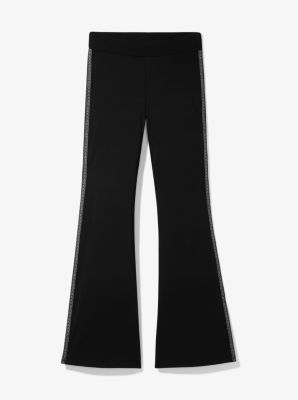 Leggings svasati in nylon stretch con fettuccia con logo in NERO | Michael Kors