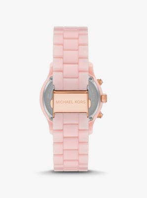 Montre Runway de ton or rose à pavé et à bracelet en acétate rose