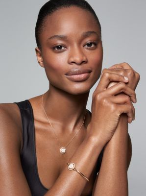 Bracelet en argent sterling &agrave; placage en or rose&nbsp;14K, &agrave; logo et &agrave; pav&eacute;