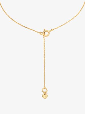 Collier &agrave; pendentif en argent sterling &agrave; placage en m&eacute;tal pr&eacute;cieux &agrave; logo et &agrave; pav&eacute; in OR | Michael Kors