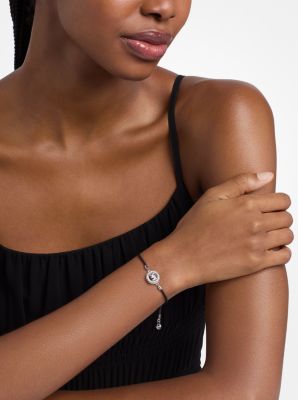 Bracelet &agrave; cordon et &agrave; pav&eacute; avec logo