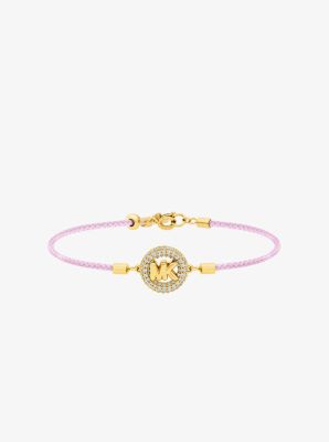 Pulsera de cord&oacute;n con logotipo e incrustaciones de pav&eacute; en tono dorado