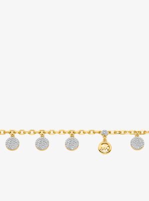 Bracelet &agrave; pav&eacute; avec breloques en forme de disque